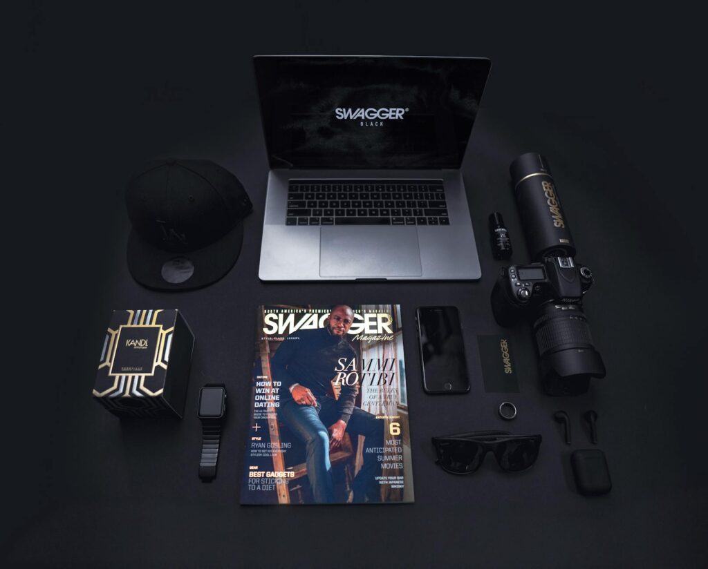Stylish flat lay featuring technology gadgets and accessories on a dark background. (Photo by Drew Williams on Pexels)